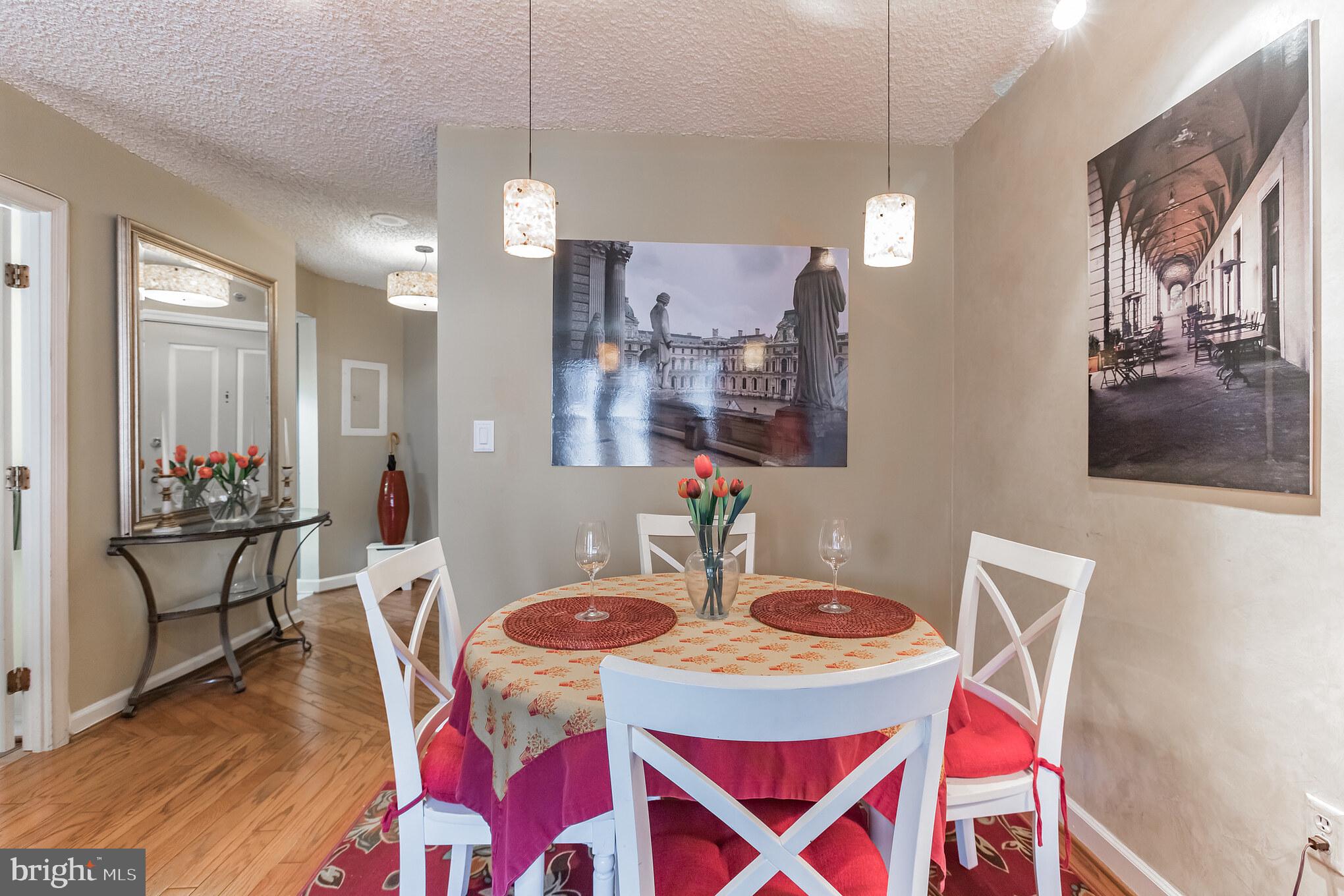 601 Pennsylvania Avenue Northwest, Unit 705 Washington, DC 20004 - Photo 8 of 29 a dining room with furniture and window