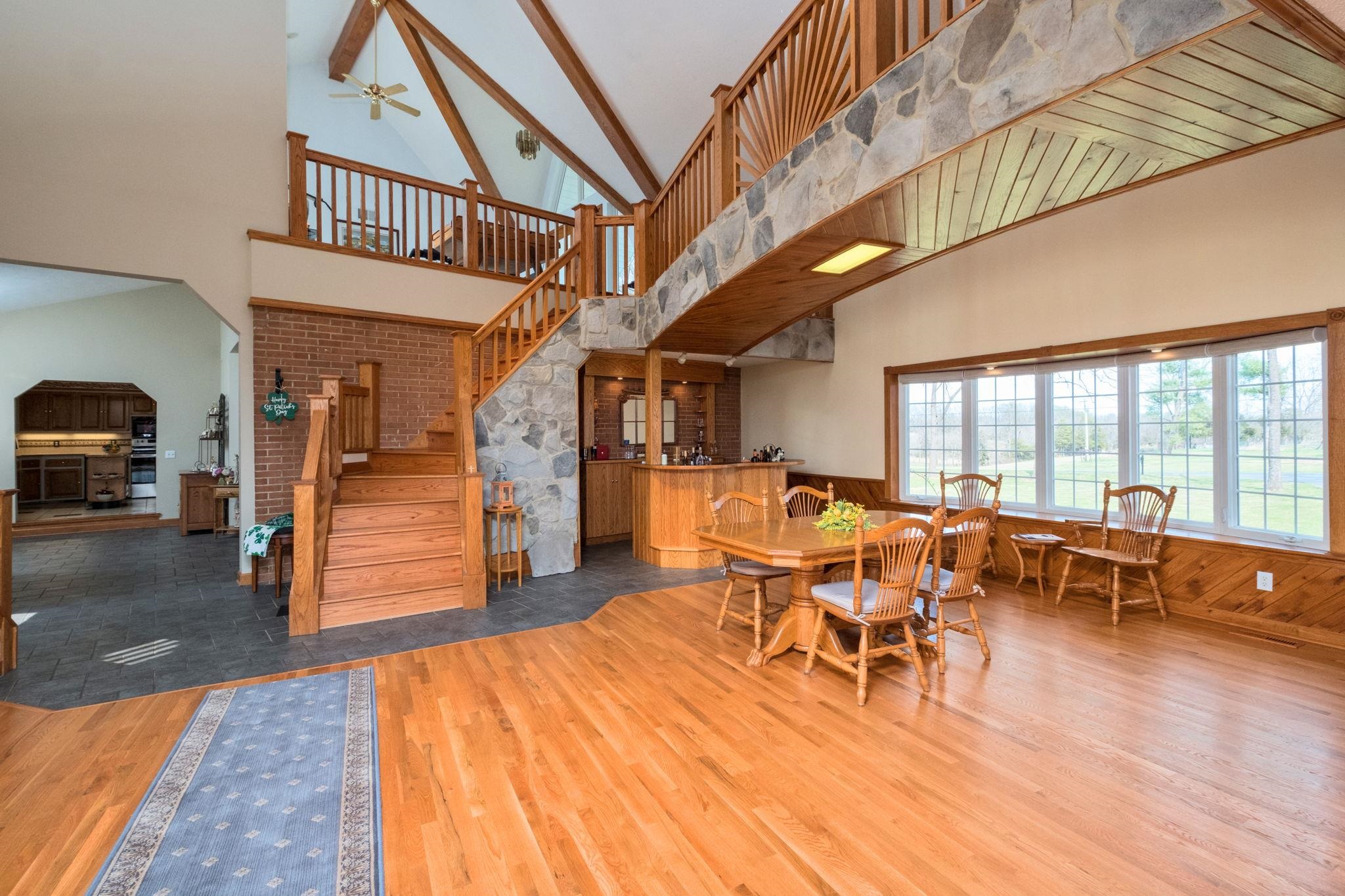 5640 Scotts Ford Road Mount Crawford, VA 22841 - Photo 22 of 68 a dining room with lots of furniture and wooden floor