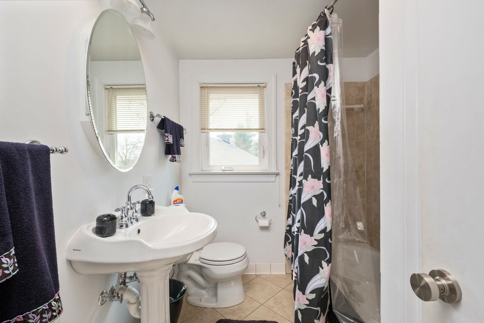 5640 Scotts Ford Road Mount Crawford, VA 22841 - Photo 44 of 68 a bathroom with a sink toilet and mirror
