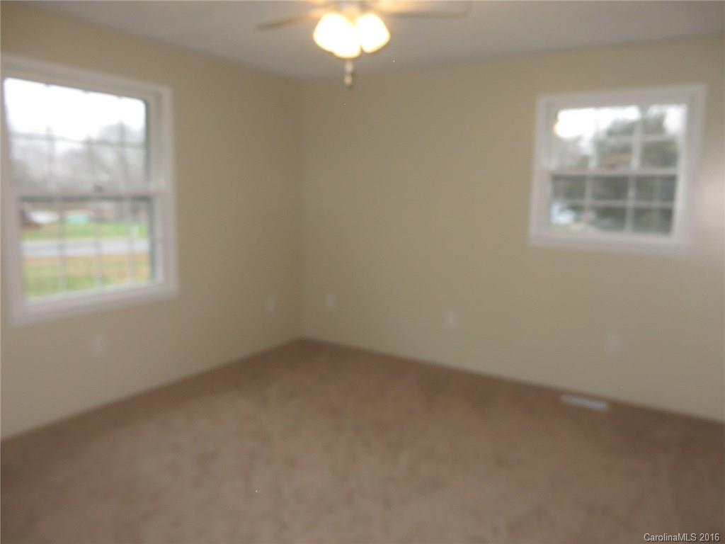536 Blacksnake Road Stanley, NC 28164 - Photo 9 of 14 an empty room with a window