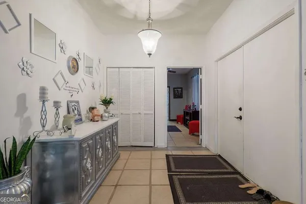 a hallway with cabinets