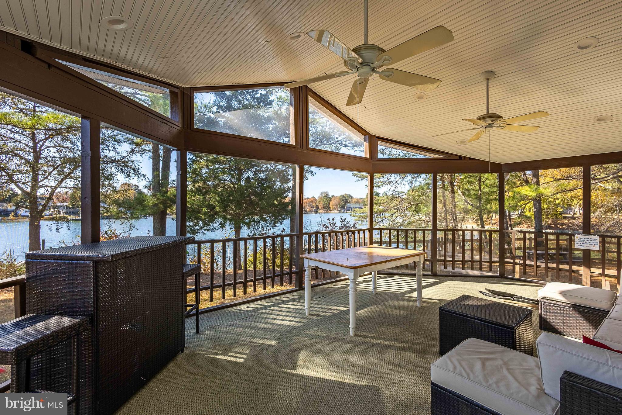 994 North Glebe Road Montross, VA 22520 - Photo 14 of 82 a living room with furniture and a floor to ceiling window
