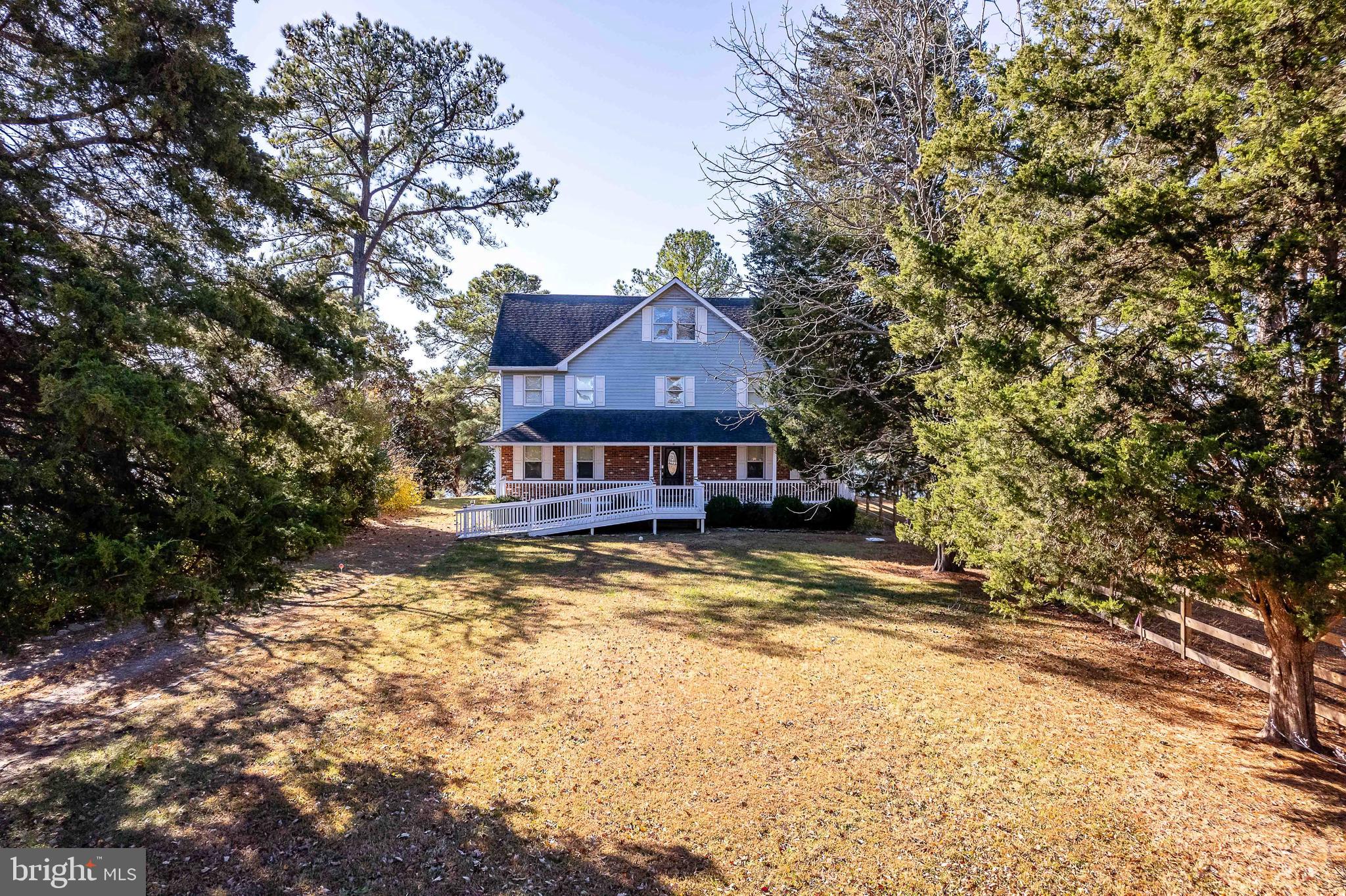 994 North Glebe Road Montross, VA 22520 - Photo 2 of 82 a view of a big house with large trees and a big yard with large trees