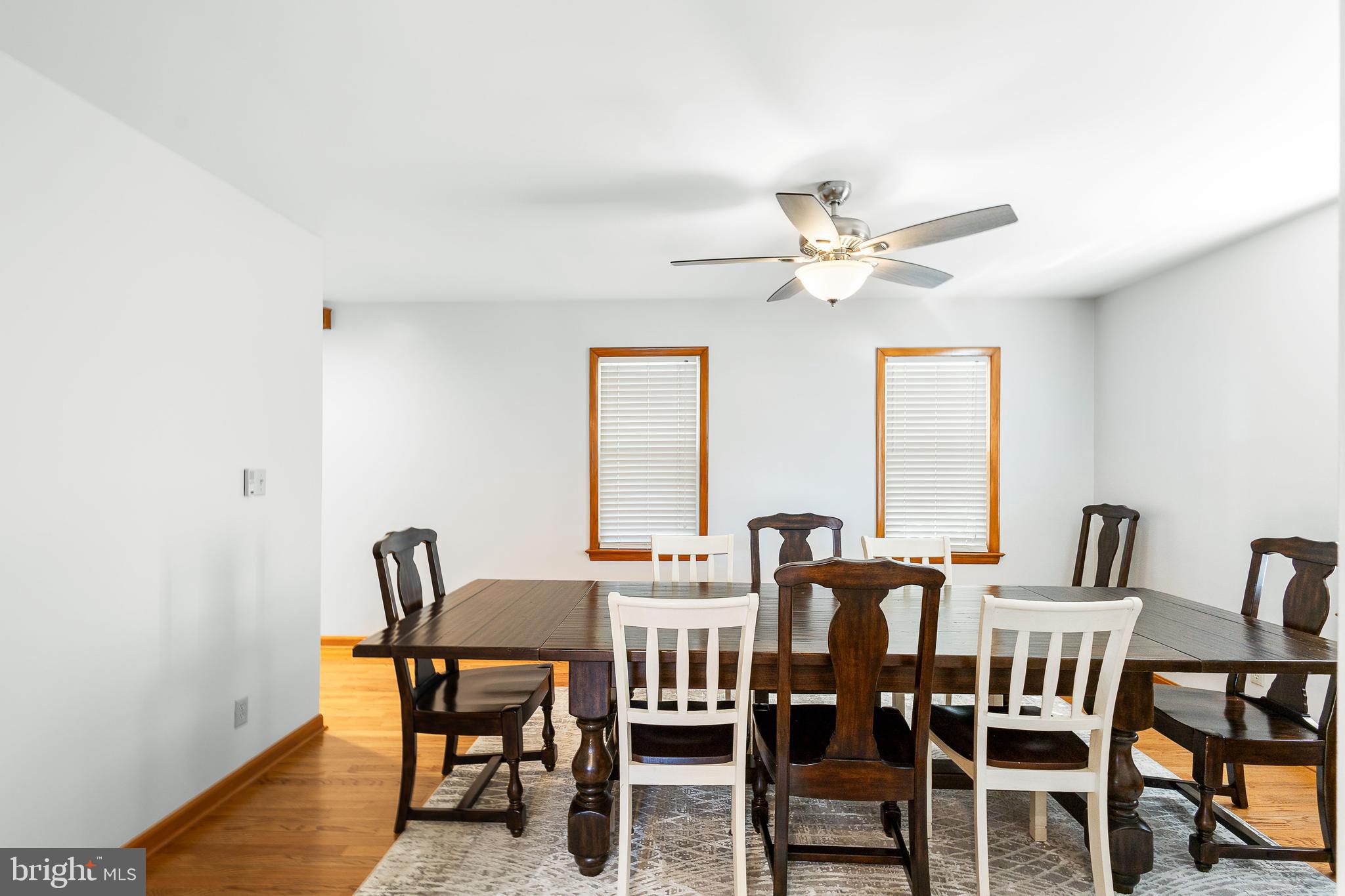 994 North Glebe Road Montross, VA 22520 - Photo 23 of 82 a view of a dining room with furniture and a chandelier