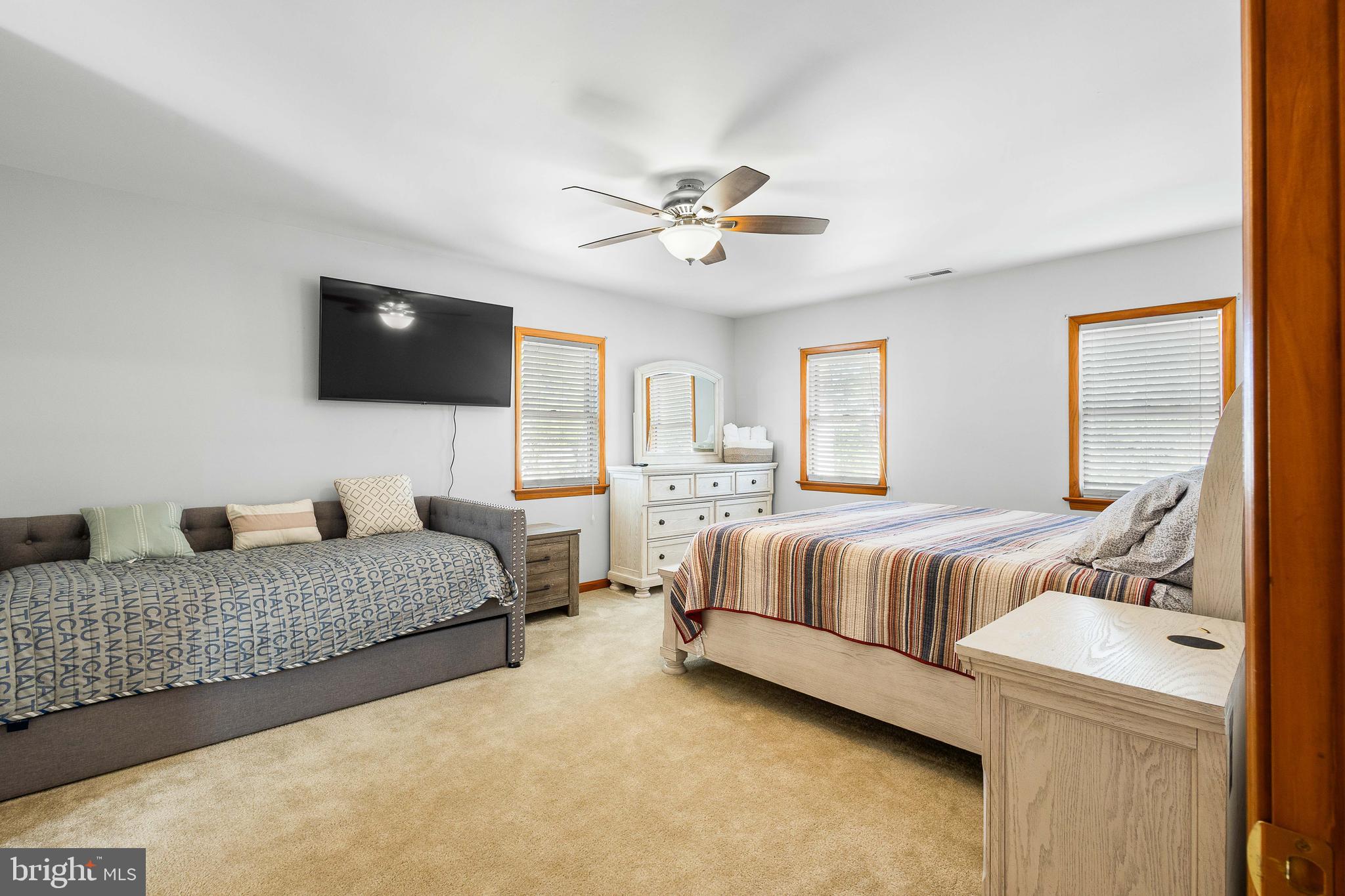 994 North Glebe Road Montross, VA 22520 - Photo 36 of 82 a bedroom with bed and a flat screen tv