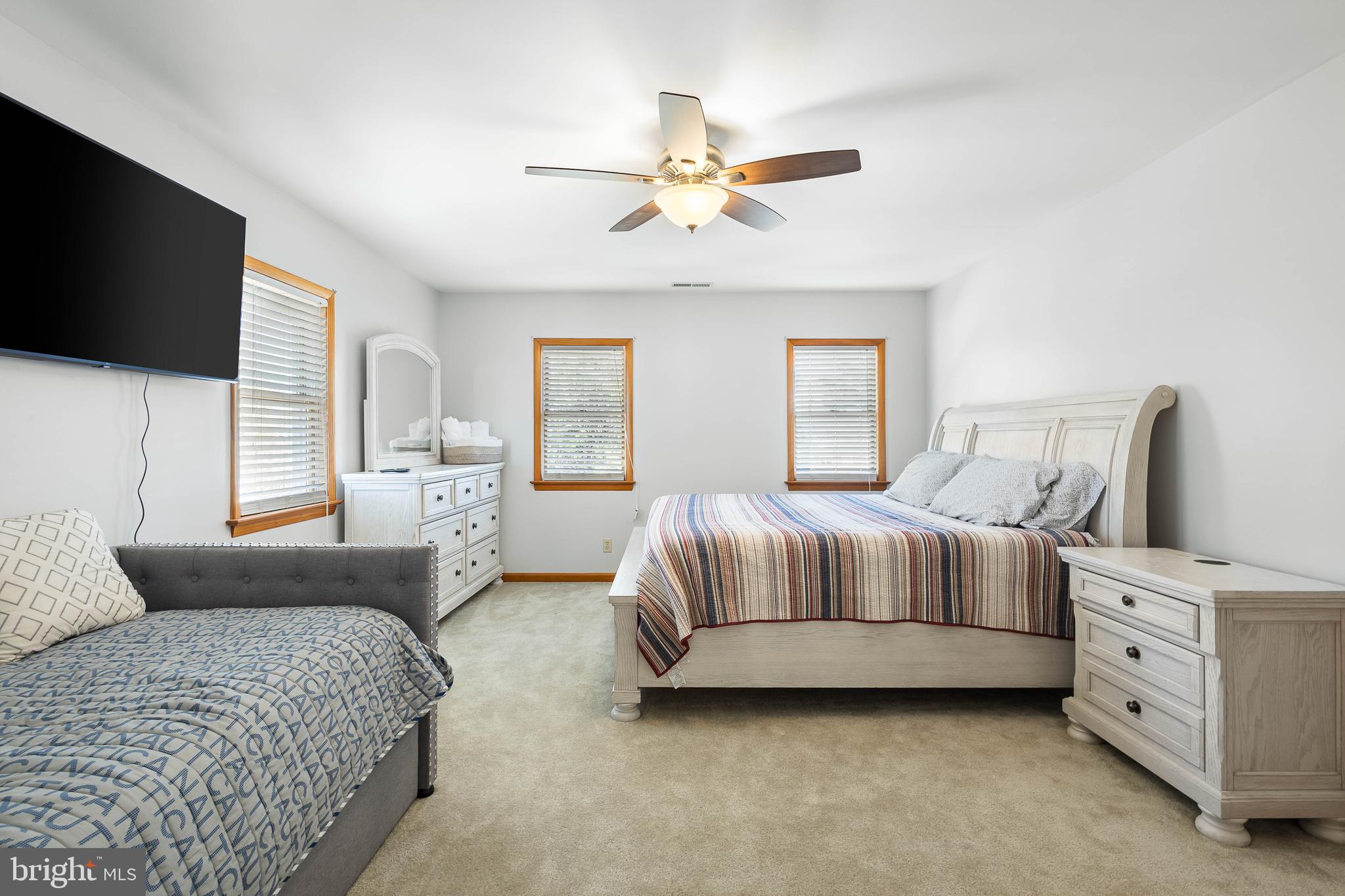 994 North Glebe Road Montross, VA 22520 - Photo 37 of 82 a bedroom with bed and flat screen tv