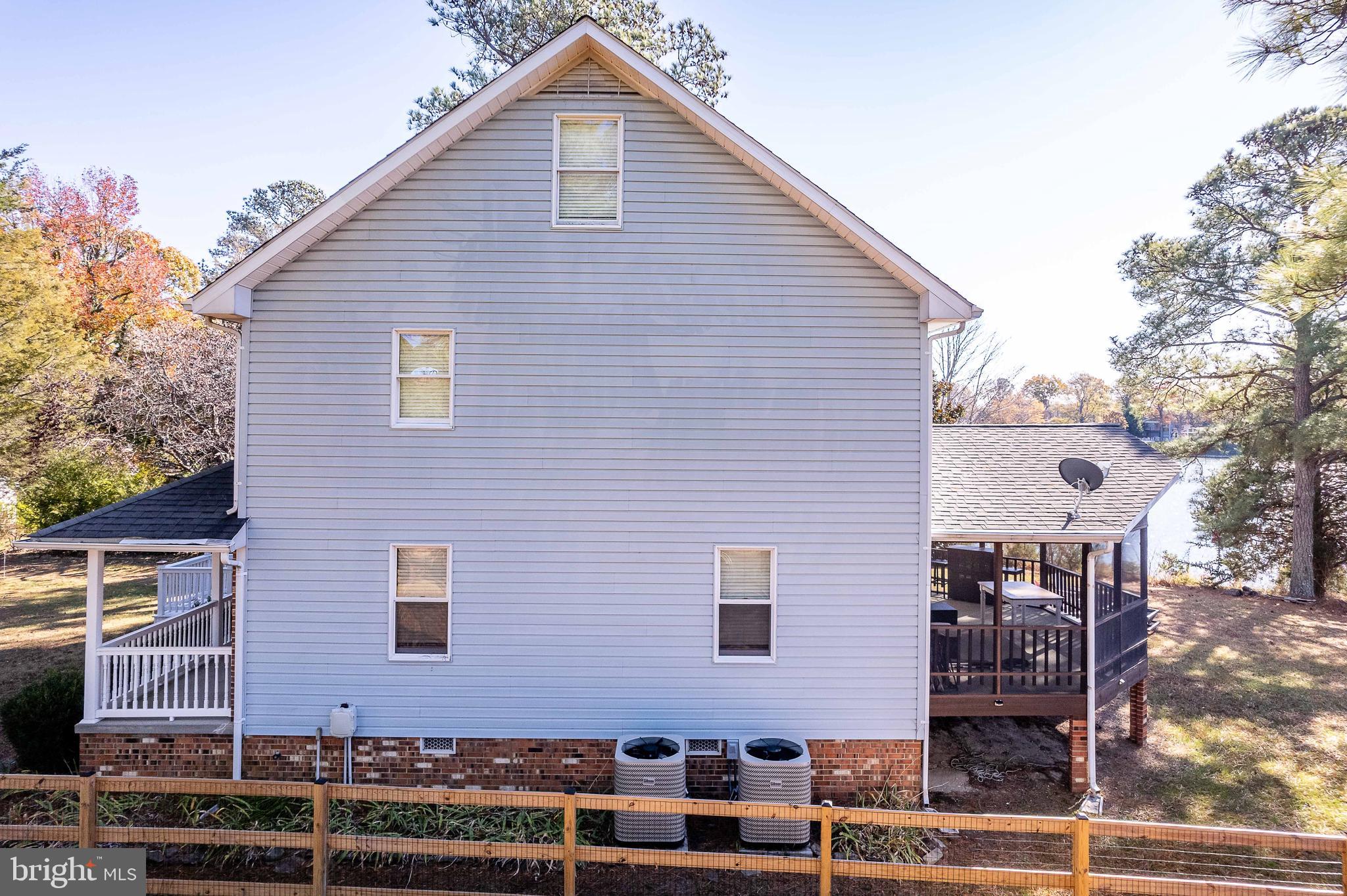 994 North Glebe Road Montross, VA 22520 - Photo 9 of 82 a front view of a house with glass windows