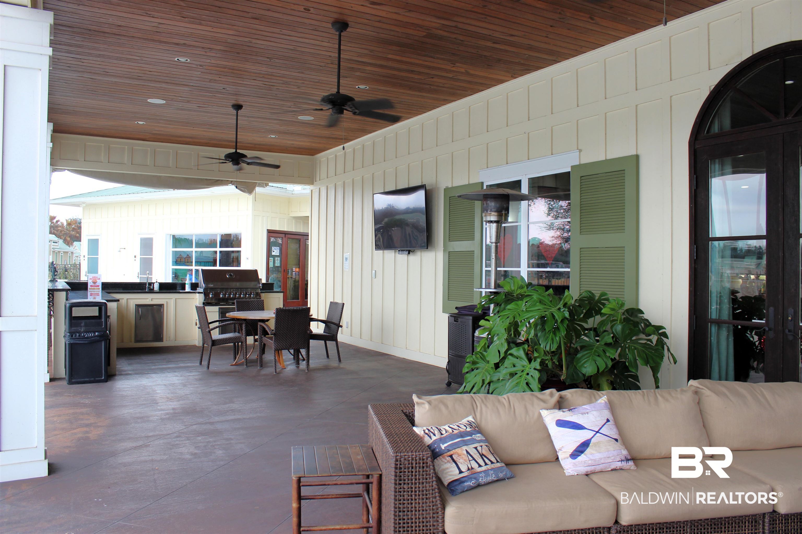 11869 Gateway Drive Elberta, AL 36530 - Photo 18 of 78 View of patio featuring outdoor dining area, a ceiling fan, area for grilling, an outdoor hangout area, and grilling area