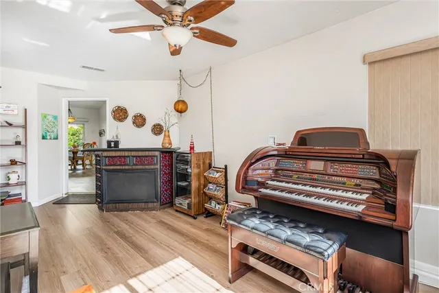 a bathroom with a sink toilet vanity and shower