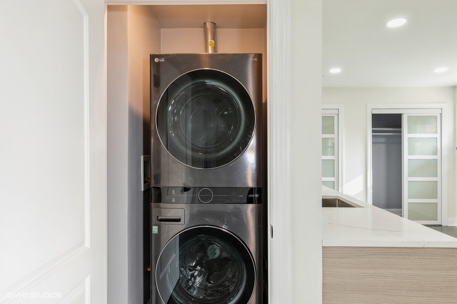 18849 Jamie Court Homewood, IL 60430 - Photo 13 of 25 a view of a hallway with washer and dryer
