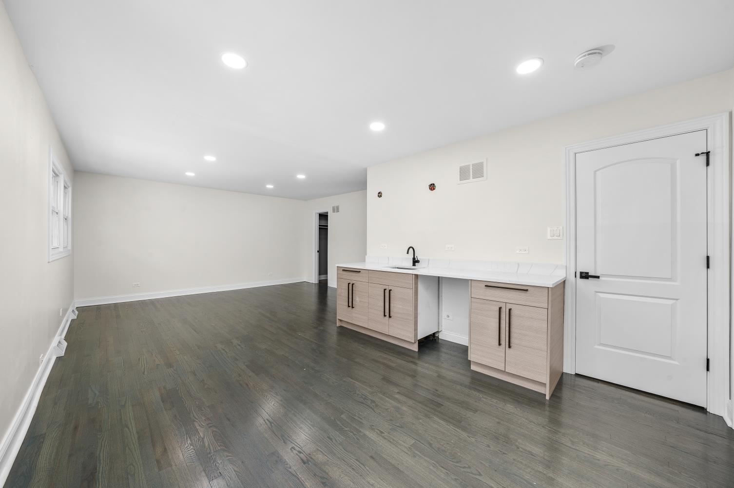 18849 Jamie Court Homewood, IL 60430 - Photo 10 of 25 a large white kitchen with a sink