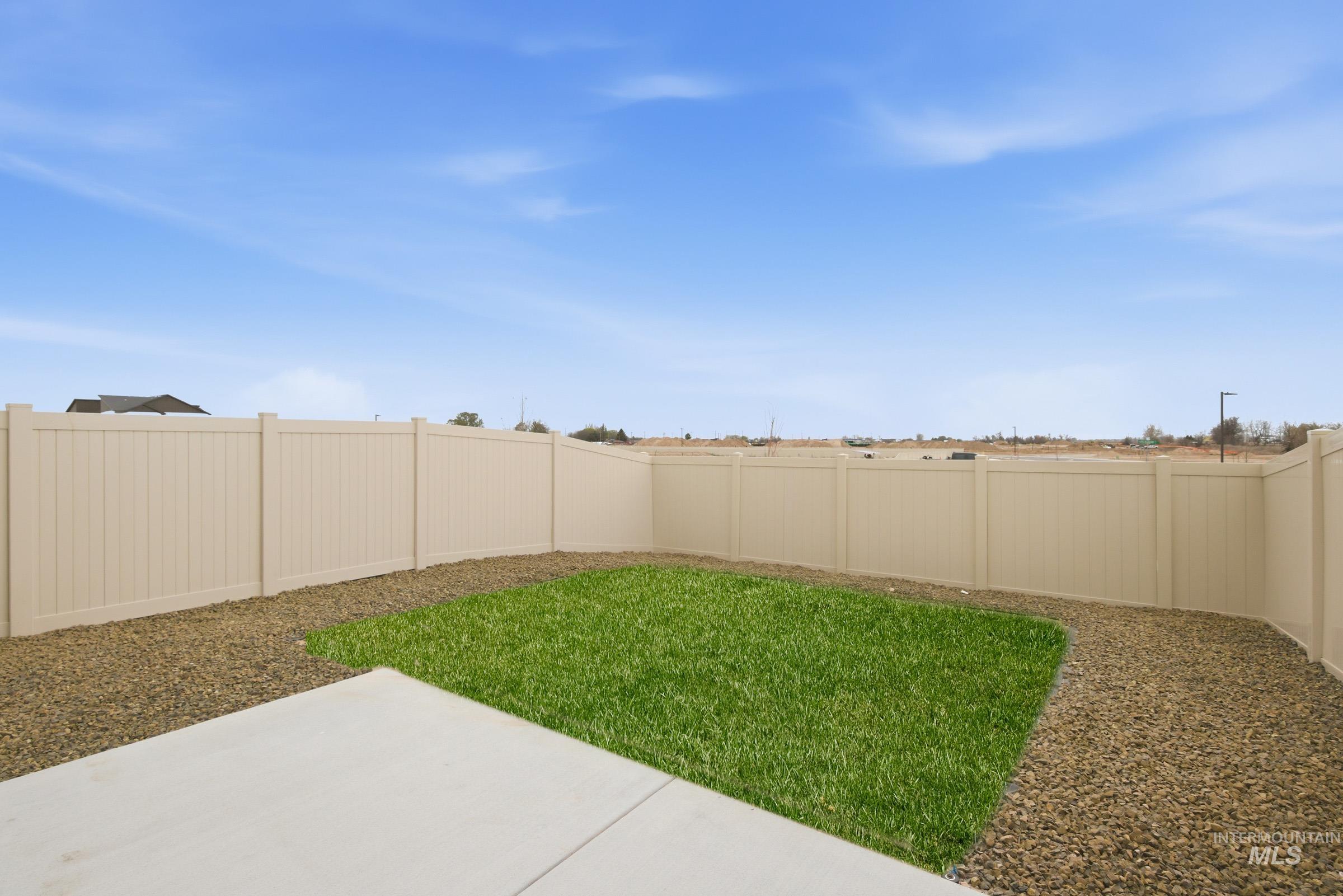 10776 Rutland Street Caldwell, ID 83605 - Photo 19 of 22 Fenced backyard featuring a patio area
