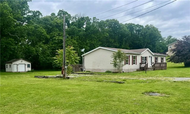 a house with garden in front of it