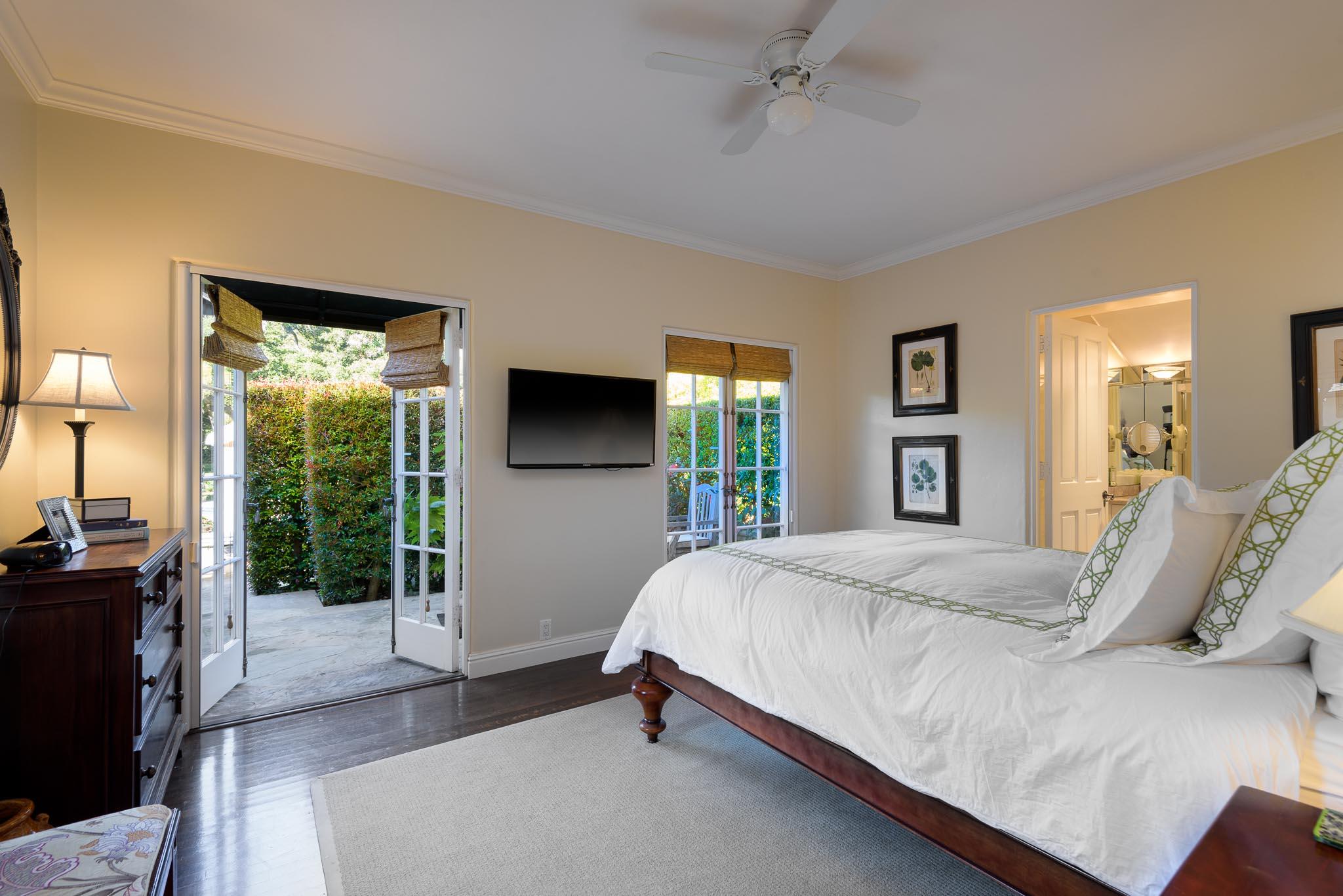 1570 East Valley Road Montecito, CA 93108 - Photo 11 of 23 a bedroom with a bed and large window