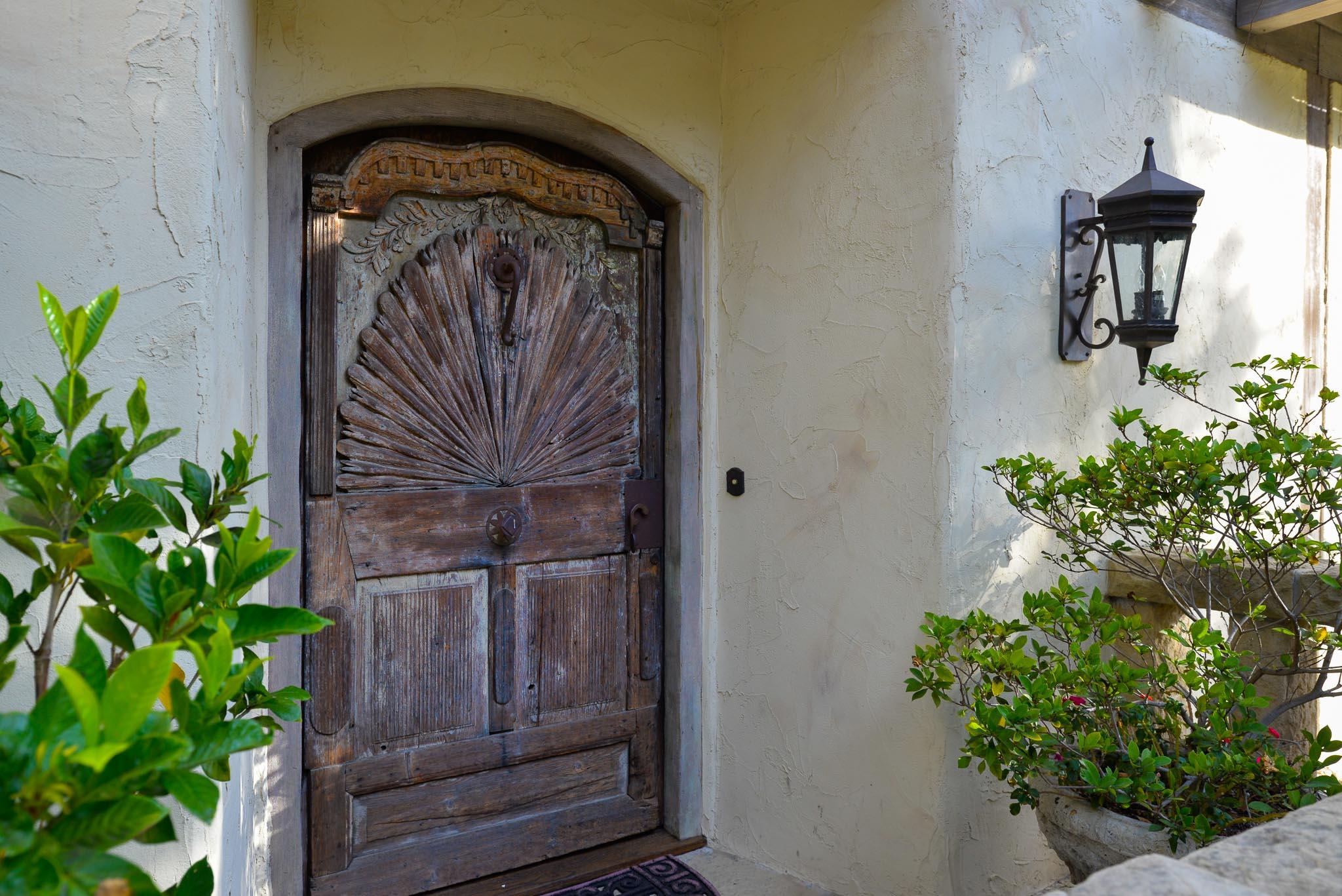1570 East Valley Road Montecito, CA 93108 - Photo 23 of 23 a close view of a potted plant in front of a door