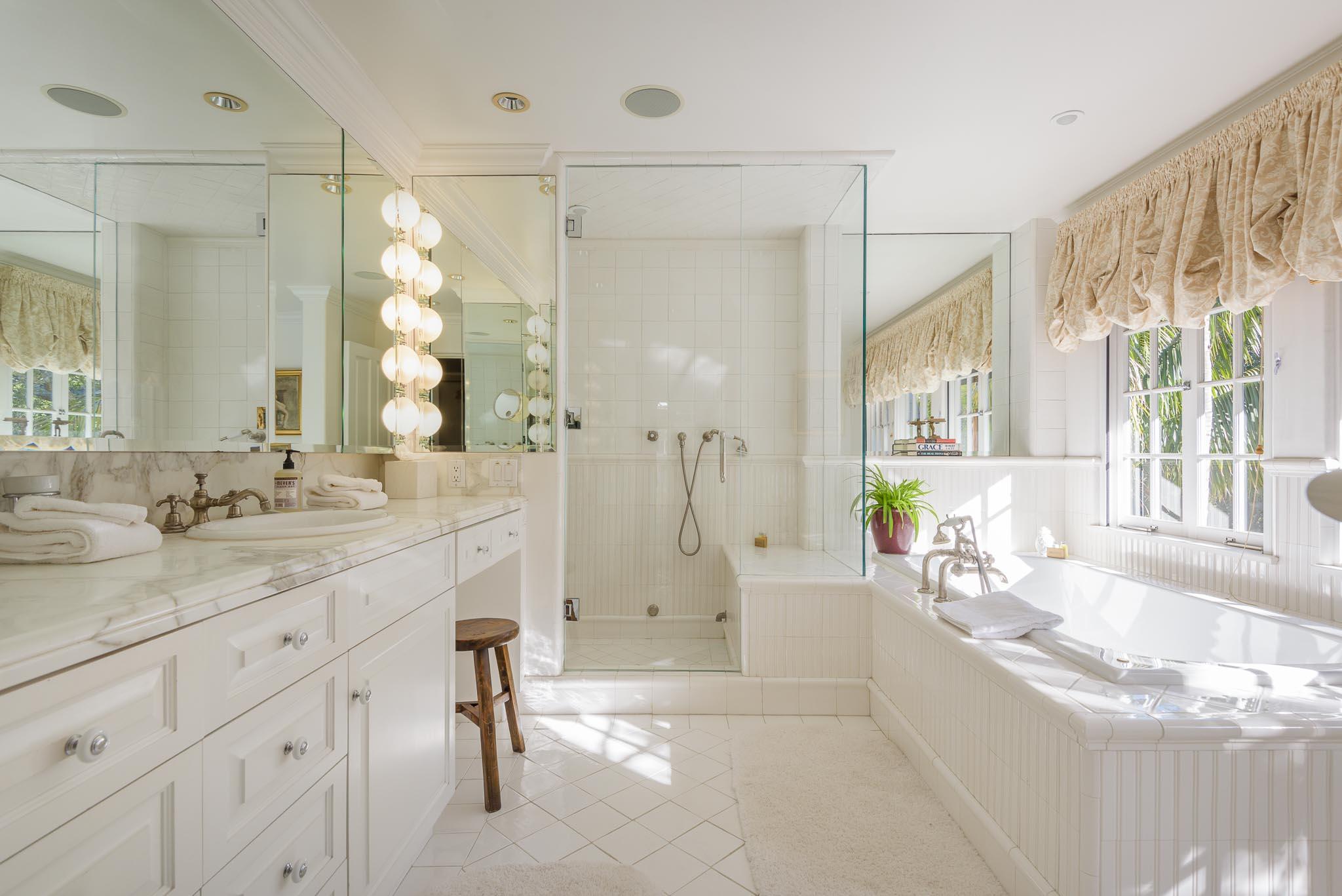 1570 East Valley Road Montecito, CA 93108 - Photo 8 of 23 a spacious bathroom with a granite countertop sink mirror and shower