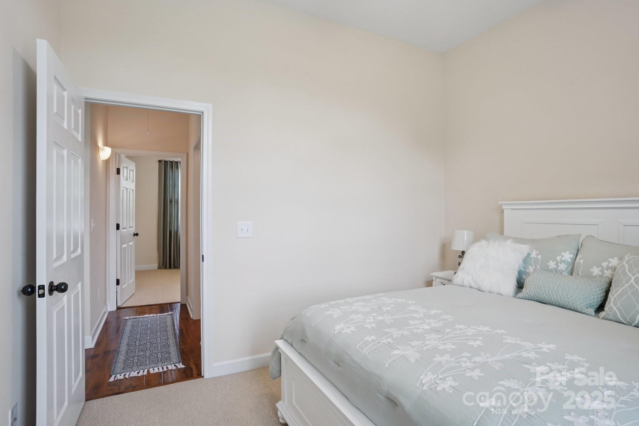 2209 Cedar Road York, SC 29745 - Photo 18 of 48 a bedroom with a bed and a mirror