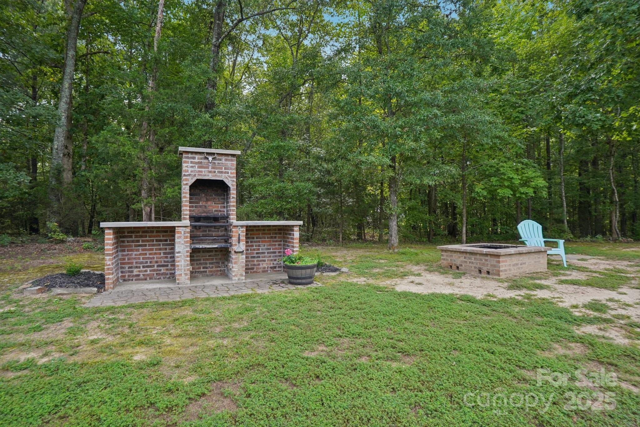 2209 Cedar Road York, SC 29745 - Photo 40 of 48 a view of a chairs and fire pit