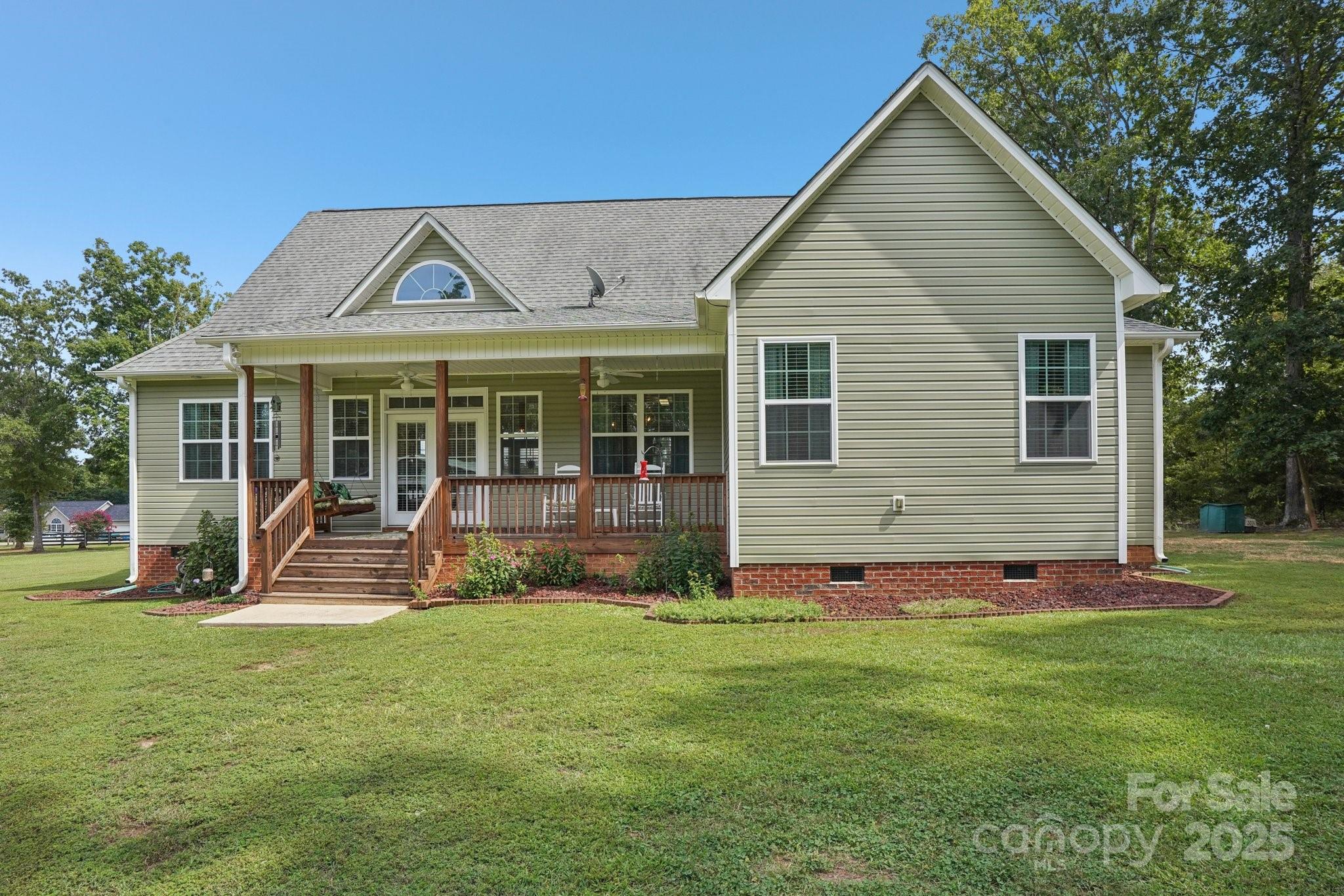 2209 Cedar Road York, SC 29745 - Photo 41 of 48 a view of a house with a yard porch and sitting area