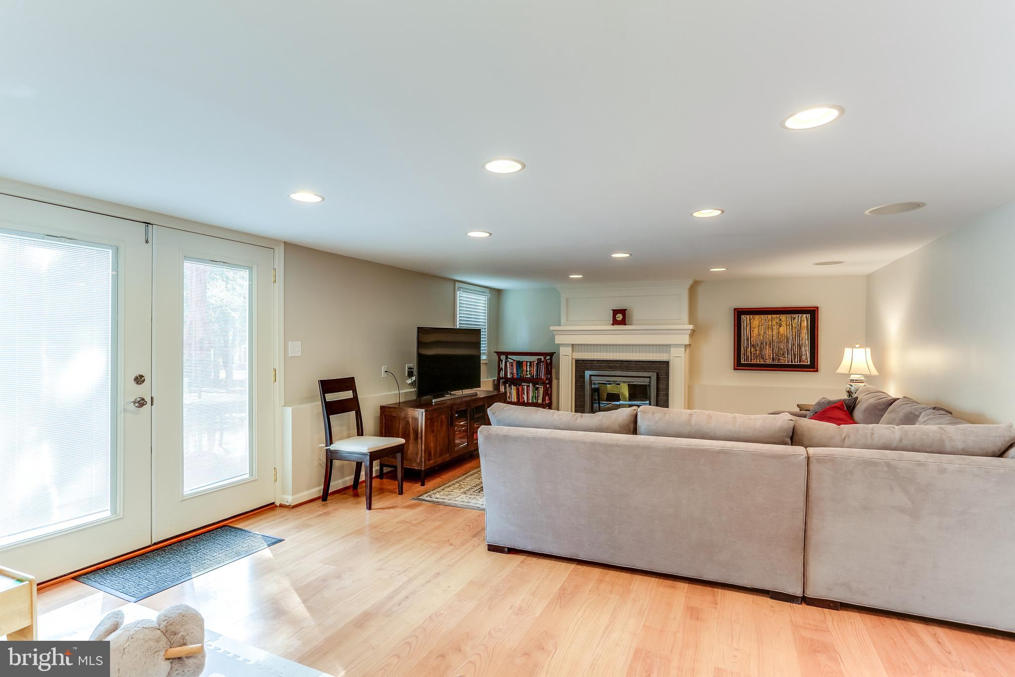 8209 Yarborough Road Baltimore, MD 21204 - Photo 24 of 33 Walk-Out Family Room w/ Gas FP