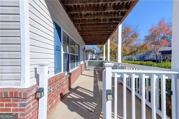 a view of a room with wooden floors and led lights