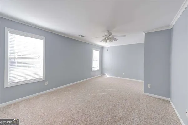 a bathroom with a sink and a window