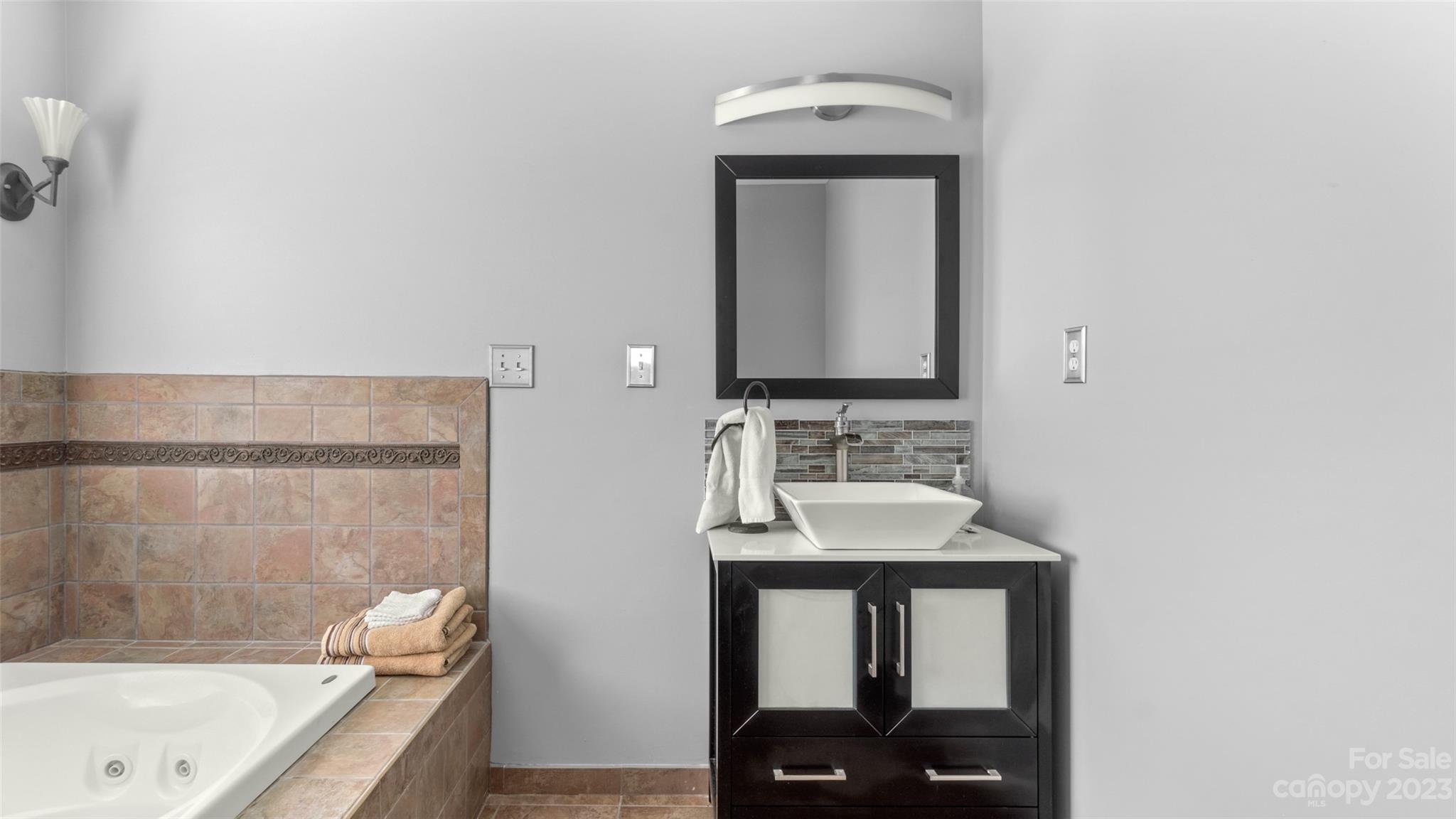 70 Rainbow Cove Ridgeway, SC 29130 - Photo 11 of 28 a bathroom with a sink and a mirror