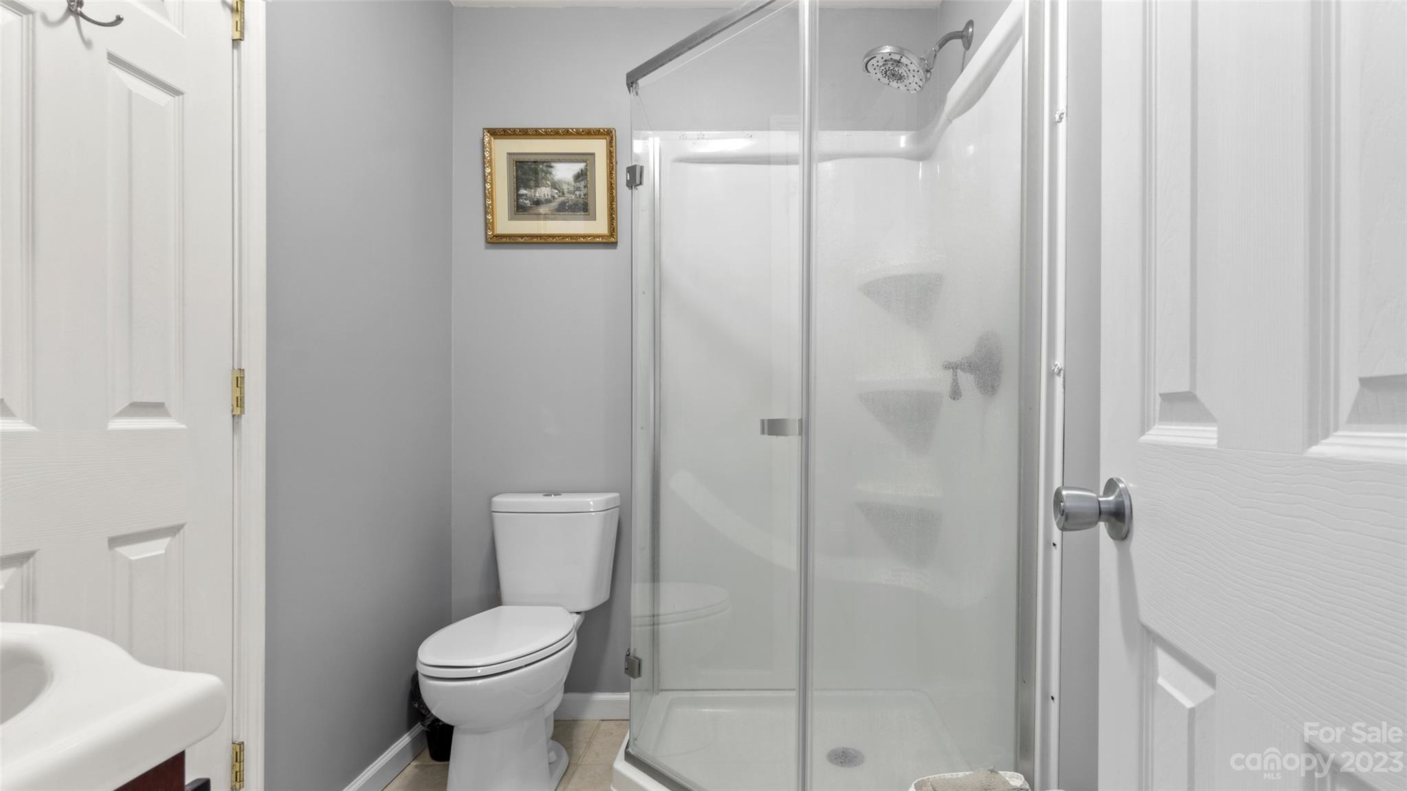 70 Rainbow Cove Ridgeway, SC 29130 - Photo 14 of 28 a bathroom with a toilet and a shower