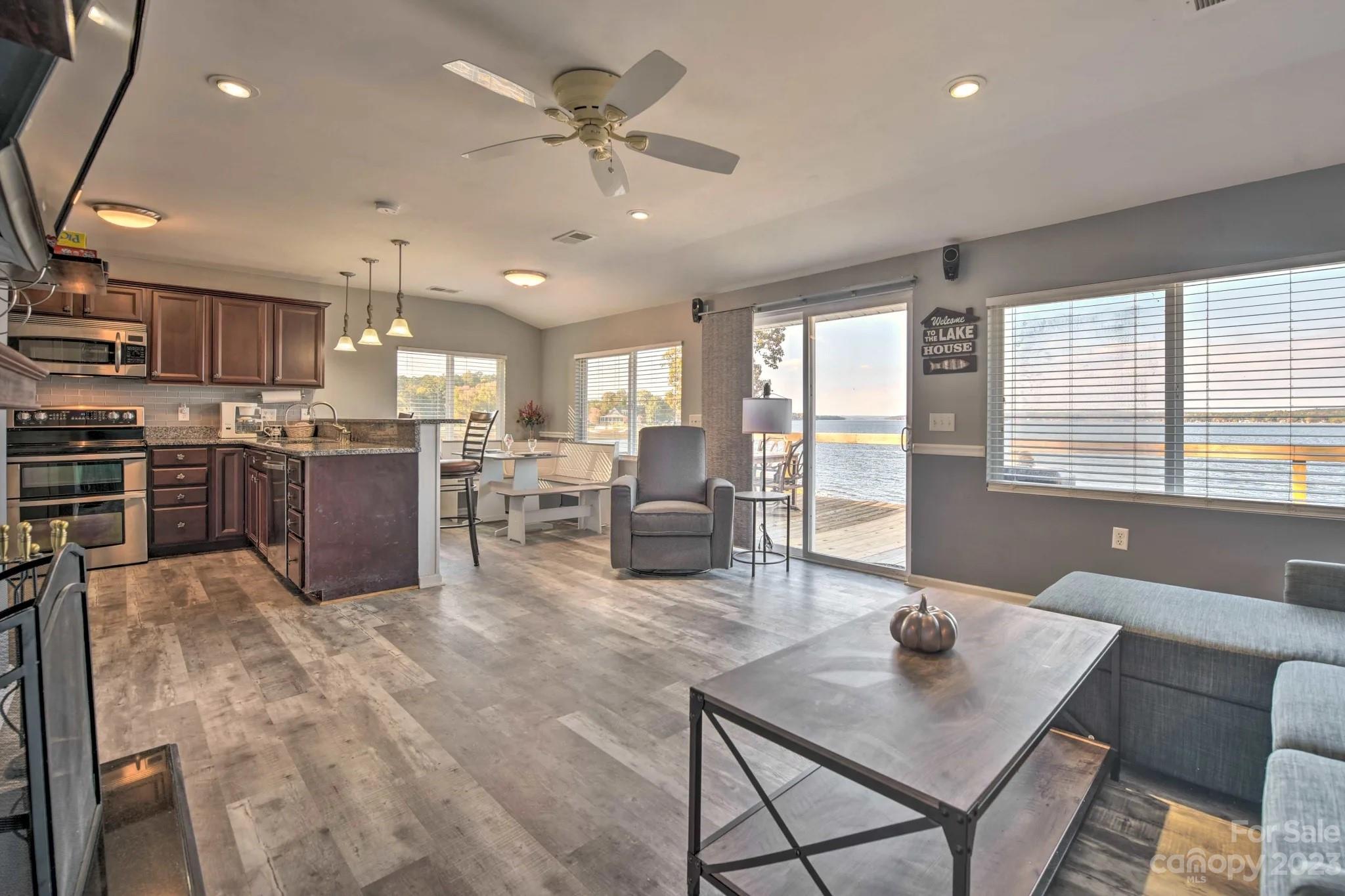 70 Rainbow Cove Ridgeway, SC 29130 - Photo 8 of 28 a living room with lots of furniture and kitchen view