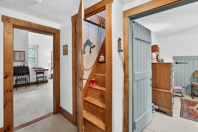 a view of a livingroom with furniture and windows