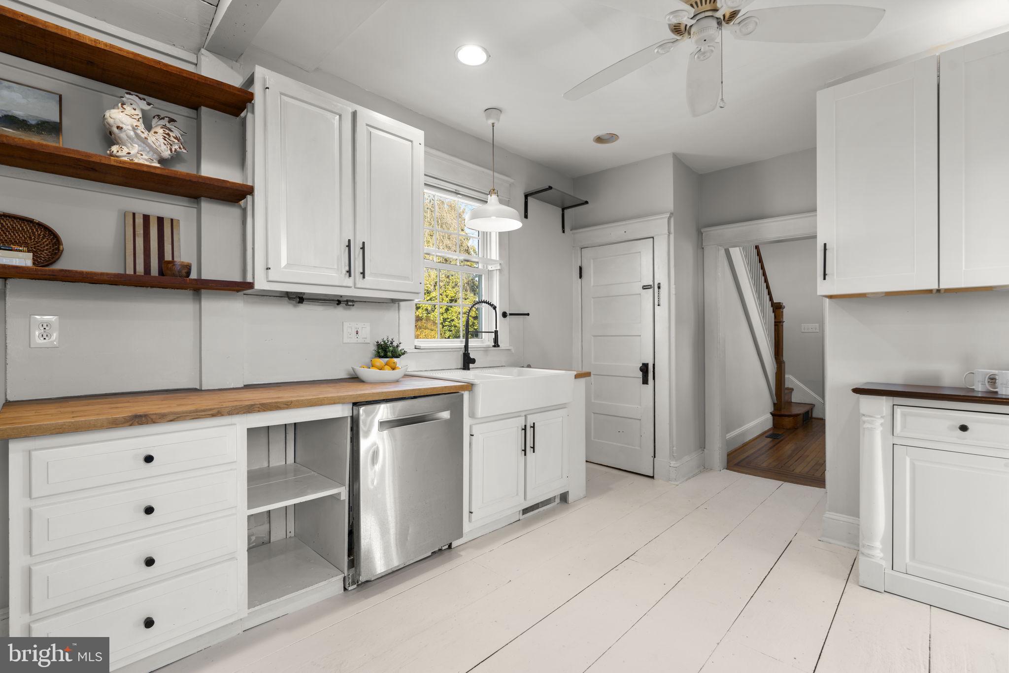 4413 Hooper Avenue Baltimore, MD 21229 - Photo 16 of 33 Ceiling fan and recessed lighting