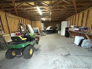 7115 Harold Street, Unit 2 Fort Lupton, CO 80621 - Photo 14 of 27 a view of a room with gym equipment