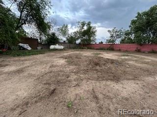 7115 Harold Street, Unit 2 Fort Lupton, CO 80621 - Photo 25 of 27 a view of dirt field with trees
