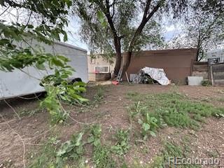 7115 Harold Street, Unit 2 Fort Lupton, CO 80621 - Photo 26 of 27 a view of a house with a tree and a tree