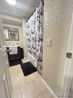 7115 Harold Street, Unit 2 Fort Lupton, CO 80621 - Photo 7 of 27 a view of bathroom with bathtub and shower