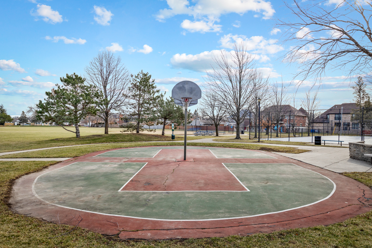 9432 Sayre Avenue Morton Grove, IL 60053 - Photo 17 of 20 a view of a playground with large trees