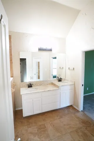 a room with a window and a ceiling fan