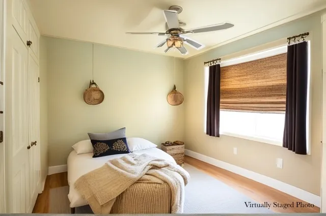 a living room with furniture a window and a fireplace