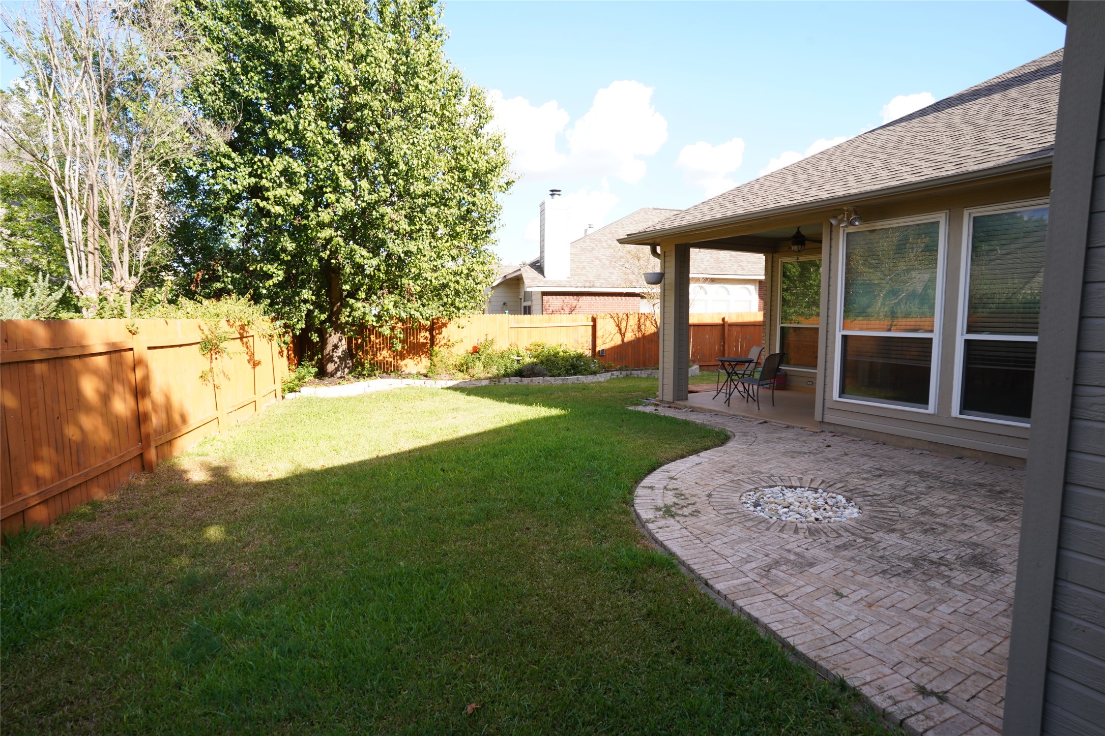 1712 Hackney Cove Austin, TX 78727 - Photo 29 of 38 a view of a house with a yard