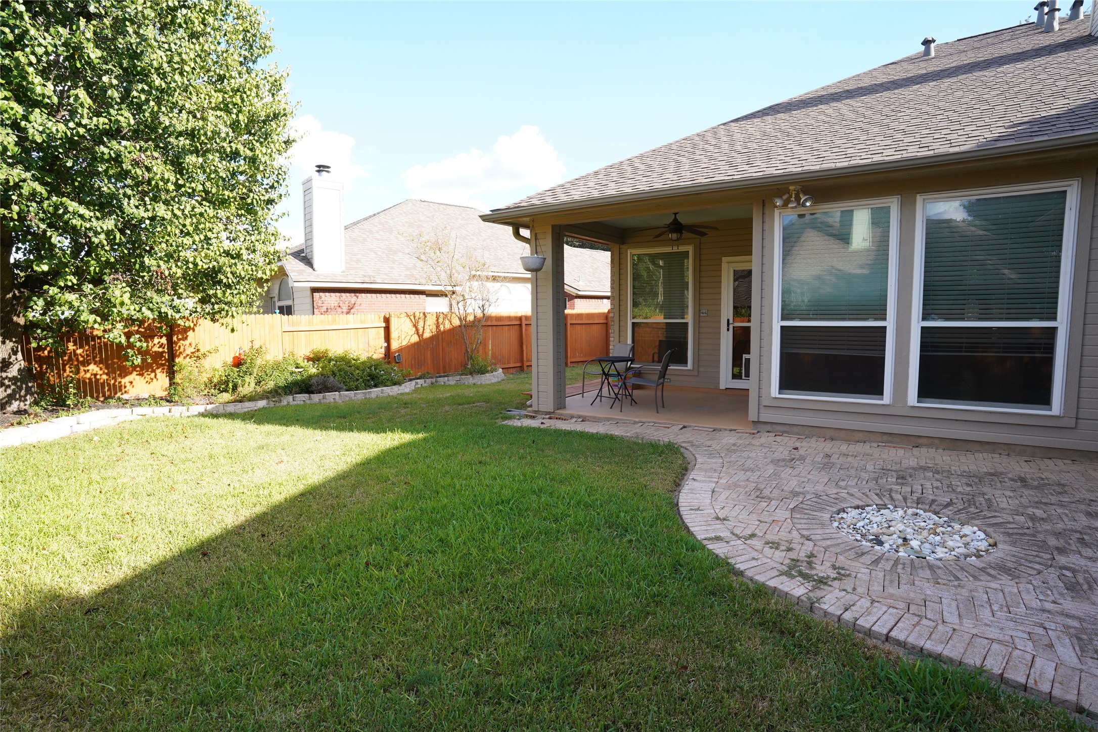 1712 Hackney Cove Austin, TX 78727 - Photo 30 of 38 a view of a house with backyard porch and garden