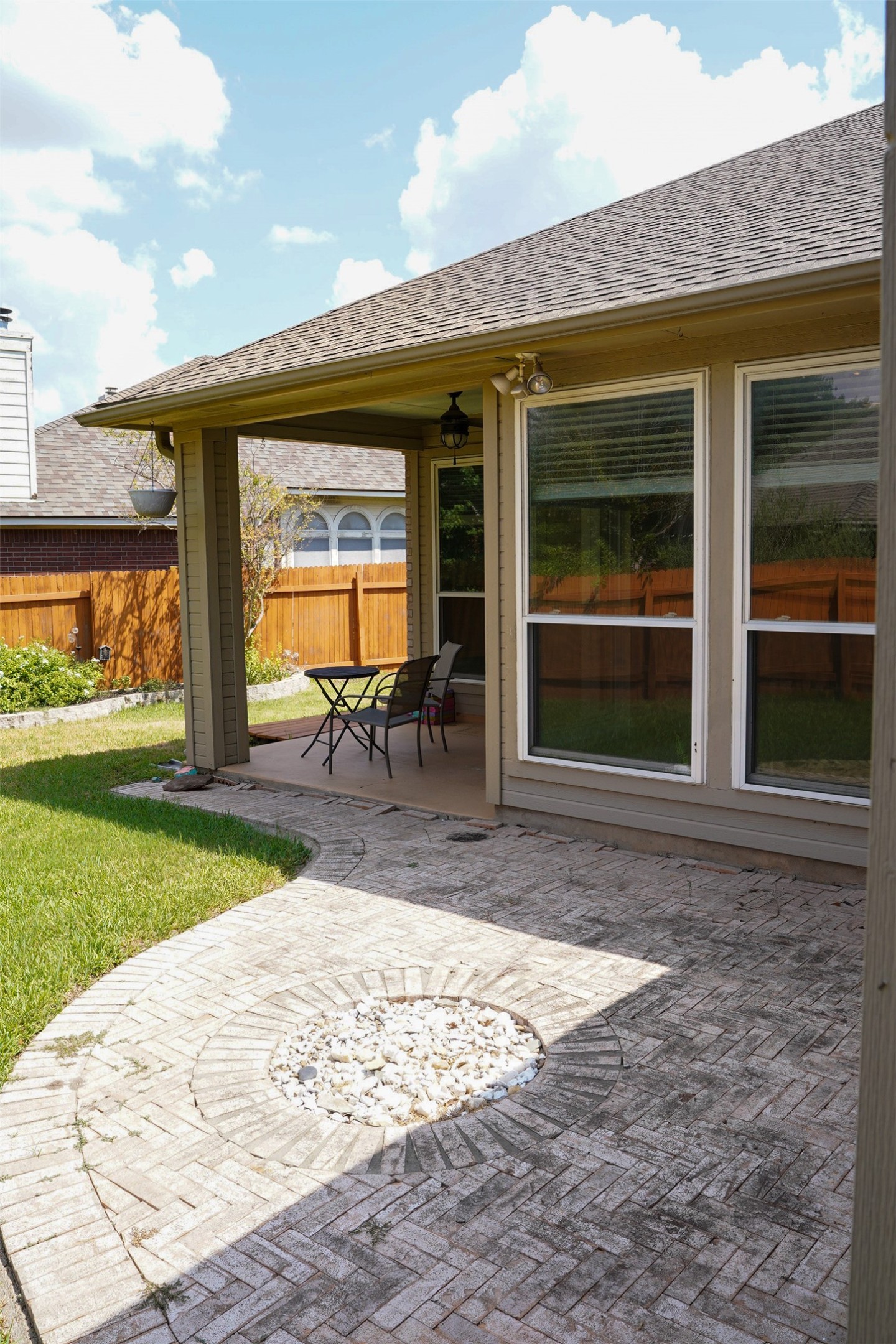 1712 Hackney Cove Austin, TX 78727 - Photo 33 of 38 a view of a house with backyard porch and sitting area