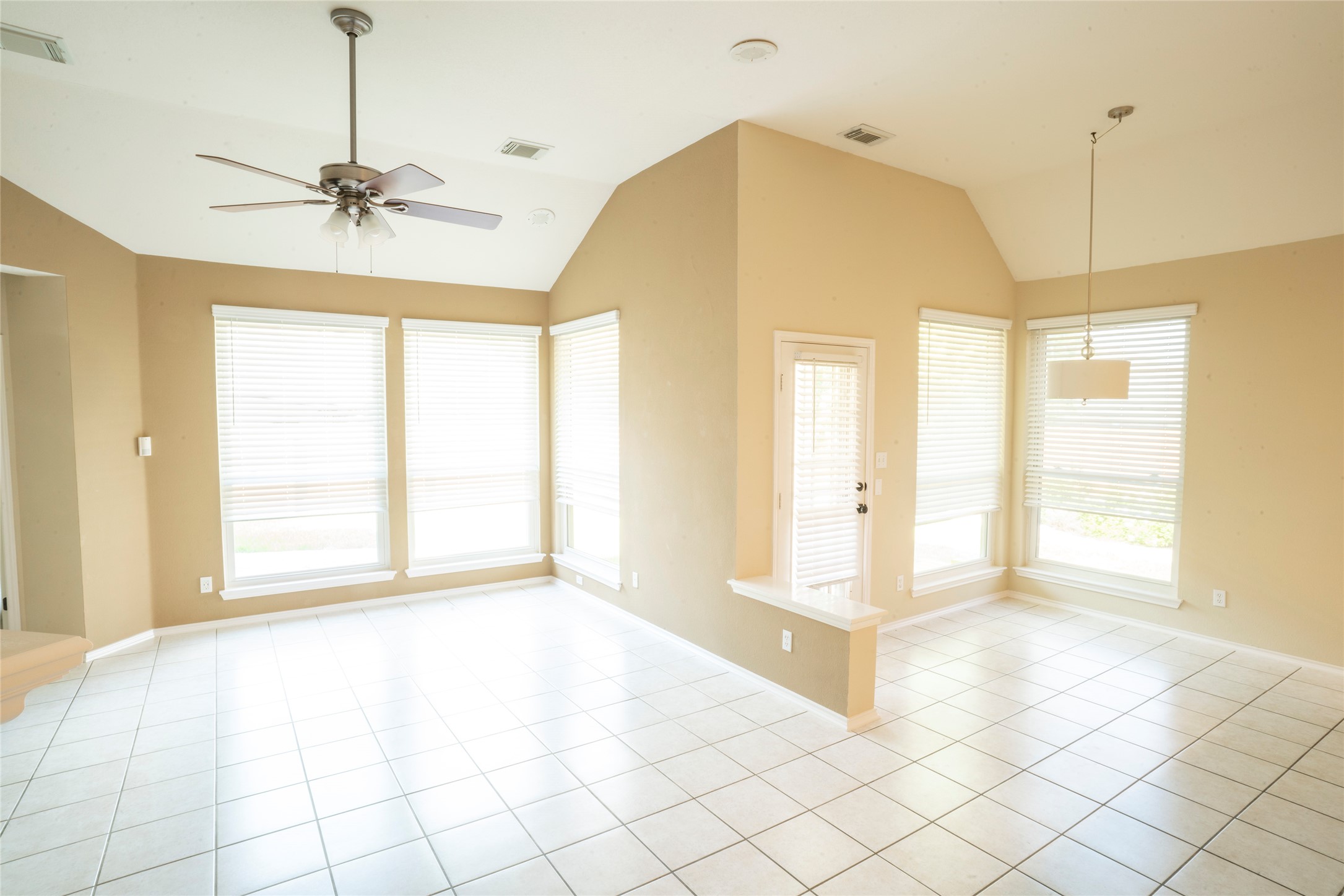 1712 Hackney Cove Austin, TX 78727 - Photo 7 of 38 a view of an empty room with a window
