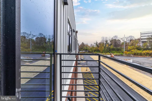 a view of a balcony with city view