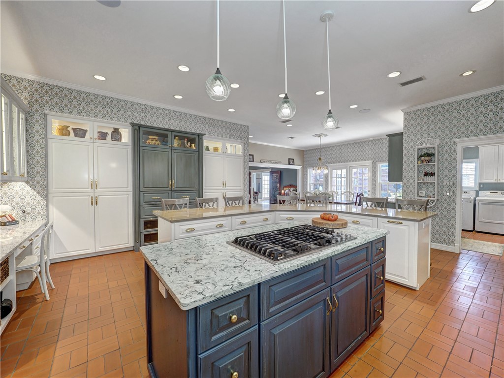 334 Pebble Beach Drive Portland, TX 78374 - Photo 13 of 40 a kitchen with granite countertop stove sink and refrigerator
