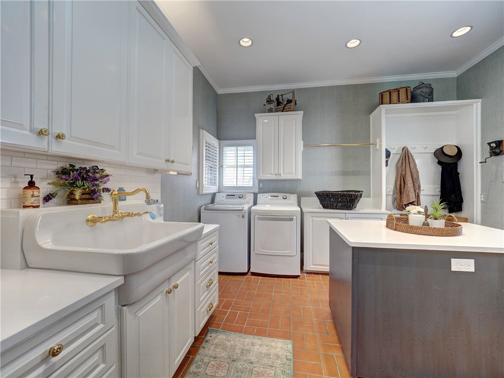 334 Pebble Beach Drive Portland, TX 78374 - Photo 16 of 40 a kitchen with a sink stove and cabinets
