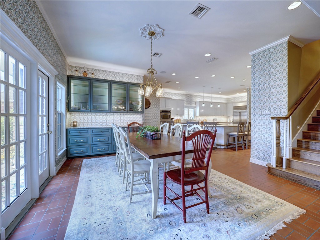 334 Pebble Beach Drive Portland, TX 78374 - Photo 17 of 40 a dining room with furniture and wooden floor