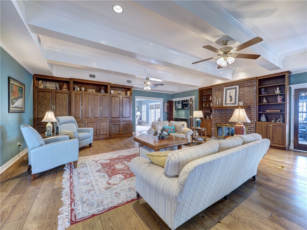 334 Pebble Beach Drive Portland, TX 78374 - Photo 18 of 40 a living room with furniture and wooden floor