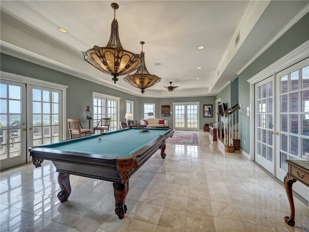334 Pebble Beach Drive Portland, TX 78374 - Photo 23 of 40 a room with lots of furniture pool table and windows