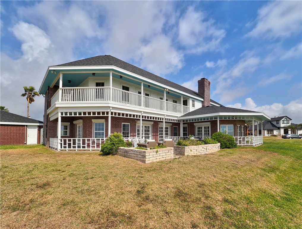 334 Pebble Beach Drive Portland, TX 78374 - Photo 28 of 40 a front view of a house with a yard