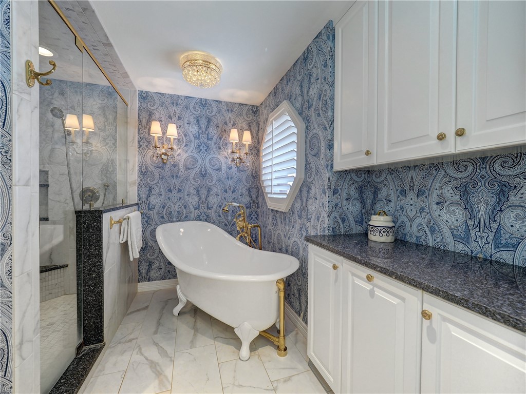 334 Pebble Beach Drive Portland, TX 78374 - Photo 33 of 40 a bathroom with a bathtub and a sink